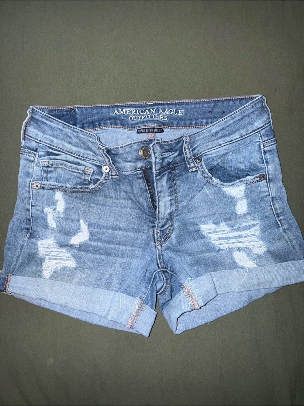 American Eagle Outfitters Distressed Rolled-Hem Jean Shorts and black tank